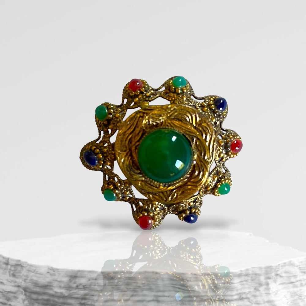 Vintage West German Brooch with Detailed Metal Work and Vibrant Stones